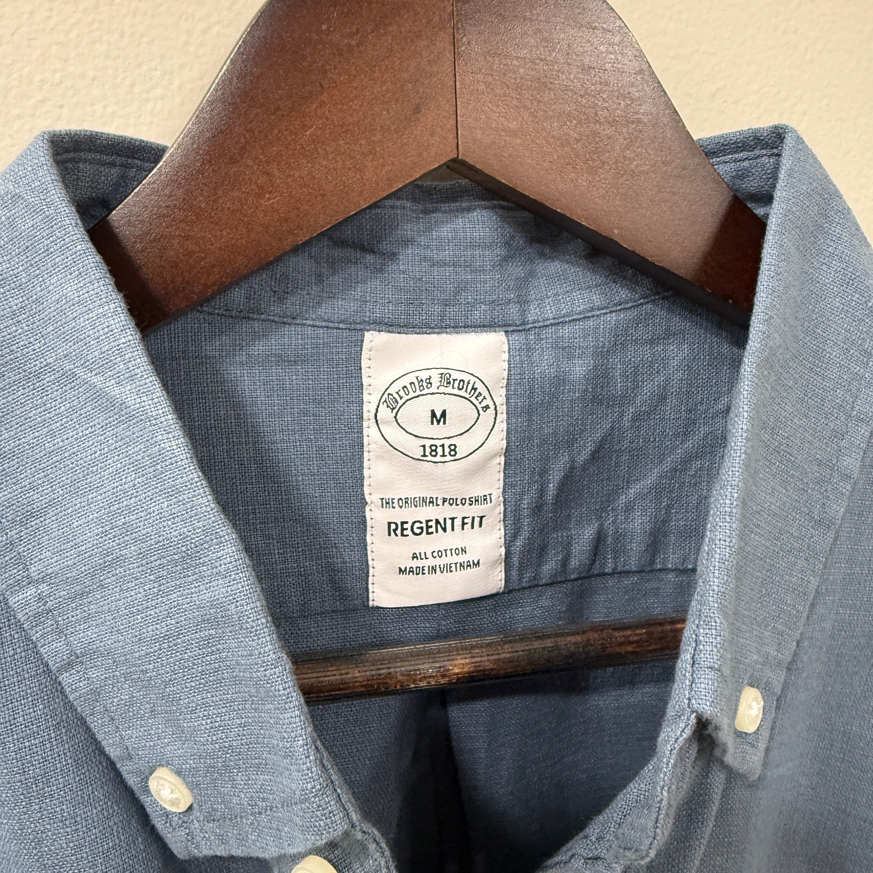 Brooks Brothers blue button down solid shirt with logo