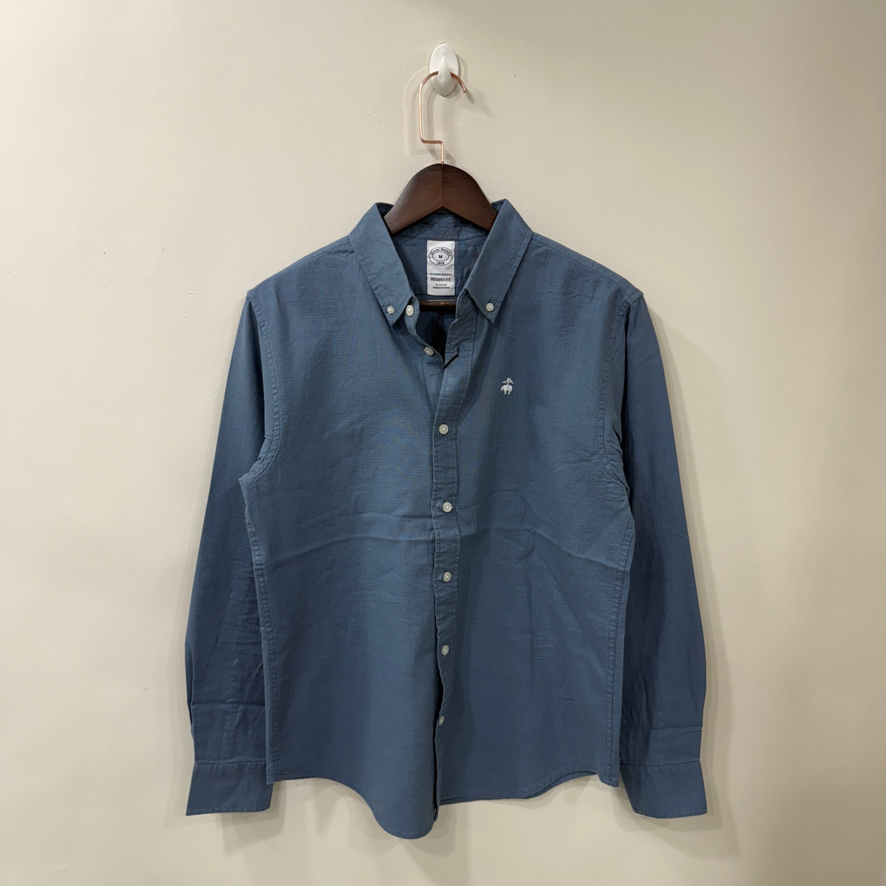 Brooks Brothers blue button down solid shirt with logo