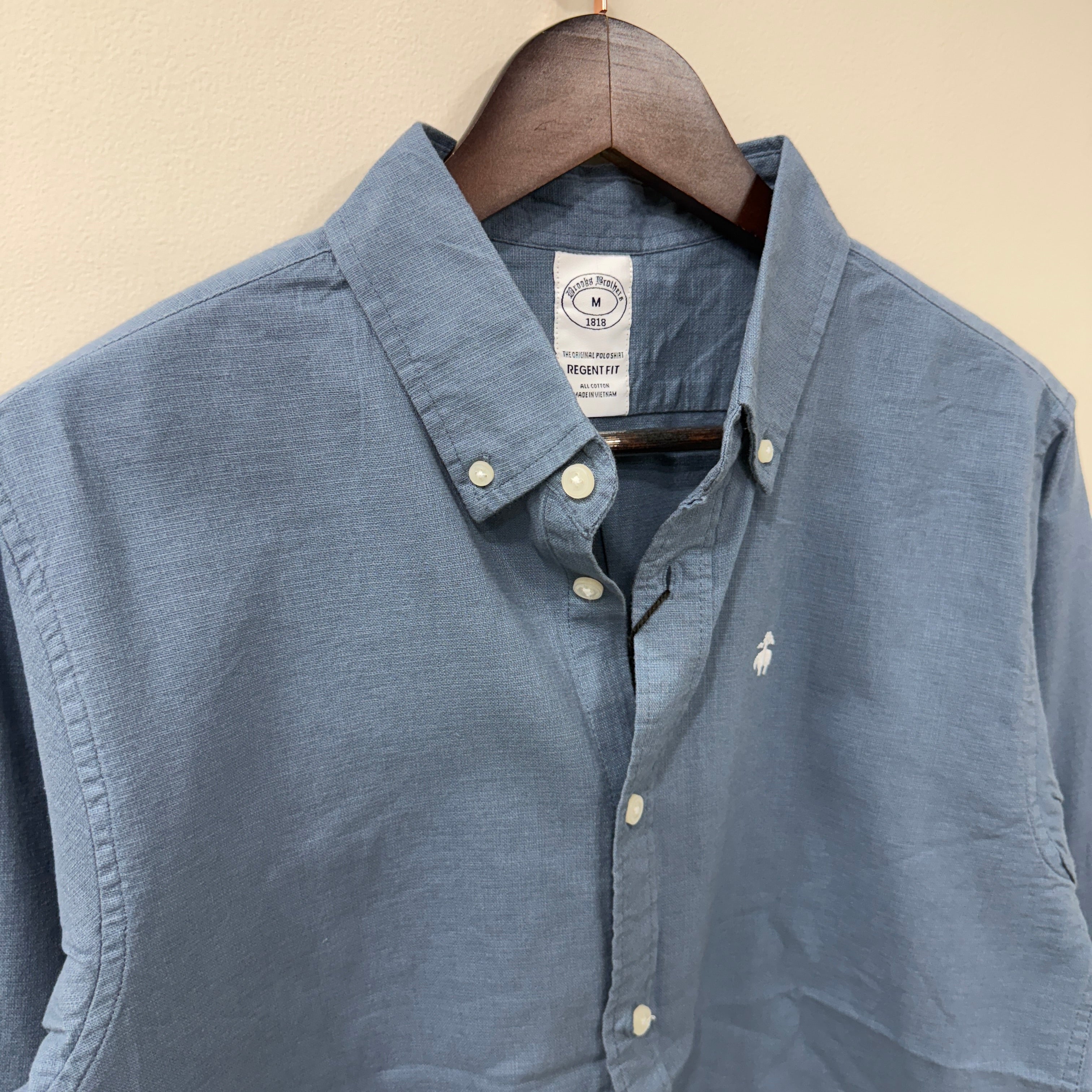 Brooks Brothers blue button down solid shirt with logo