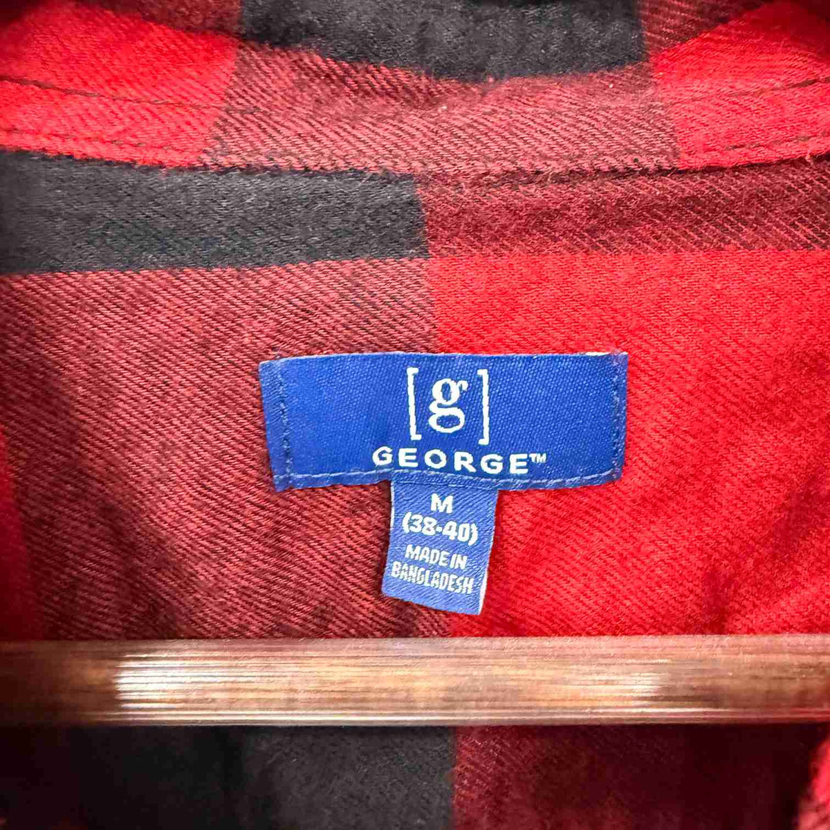 George red checkerd shirt
